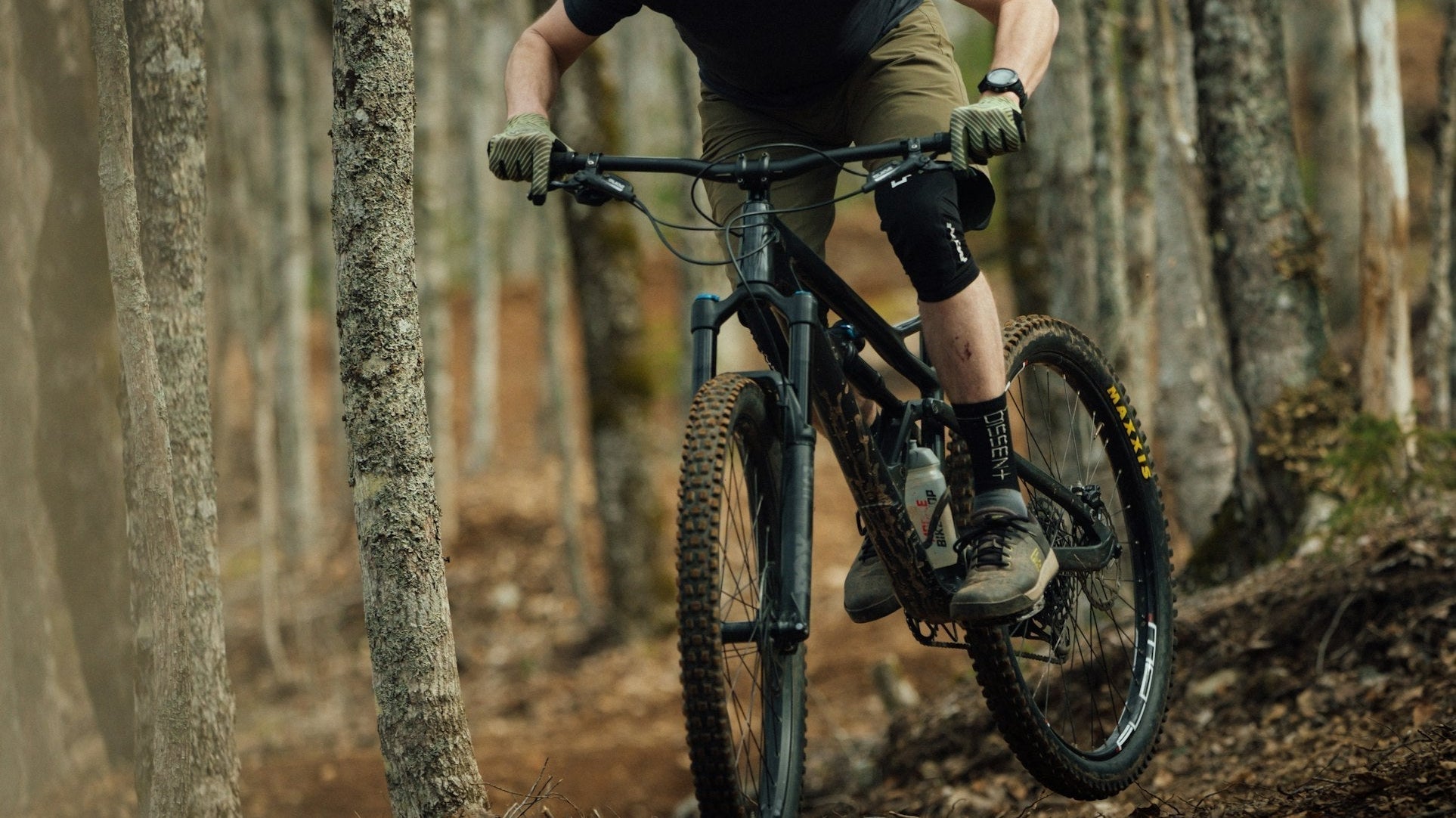 person on a bike in forest