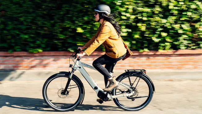 woman riding electric bike