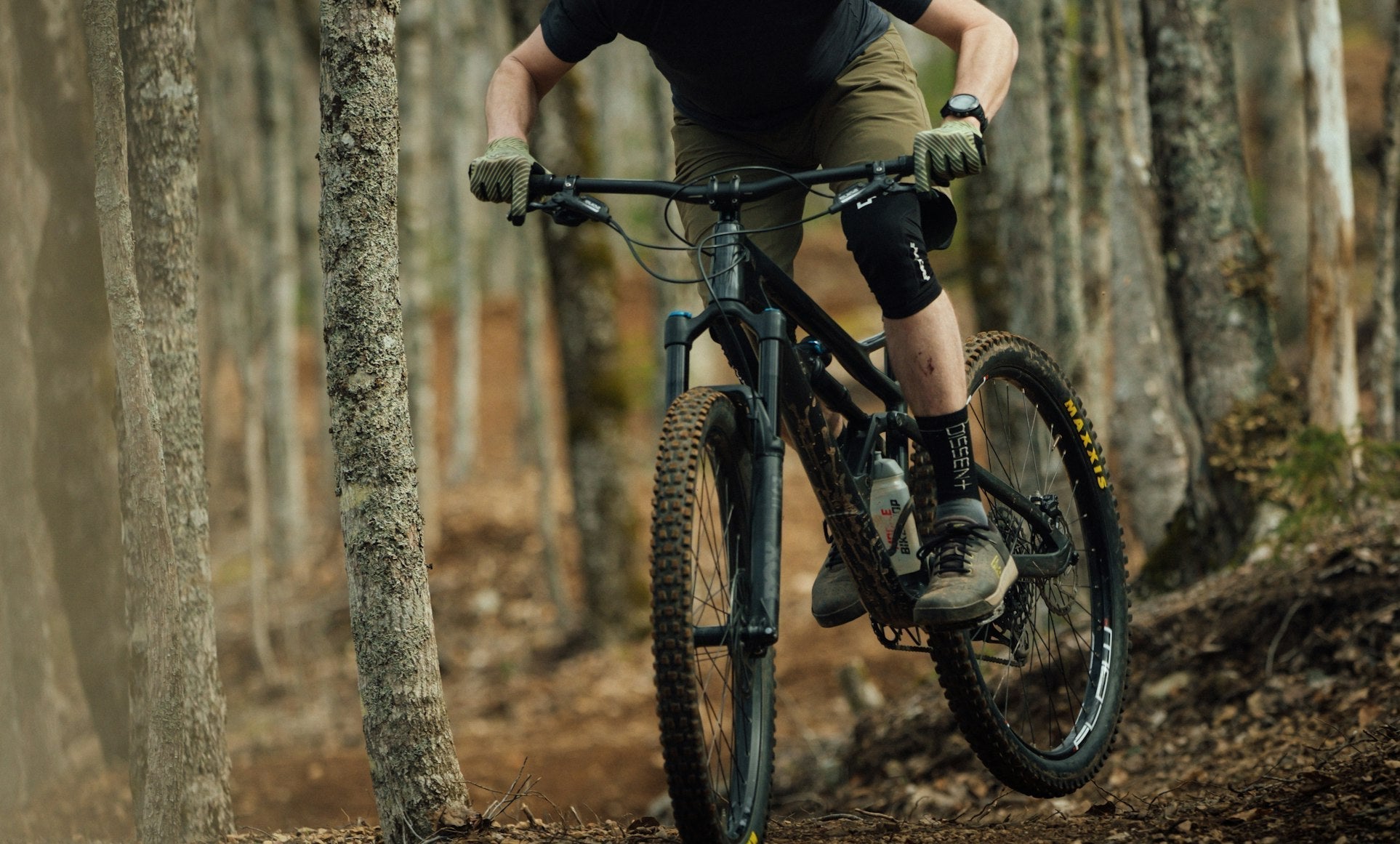 person on a bike in forest